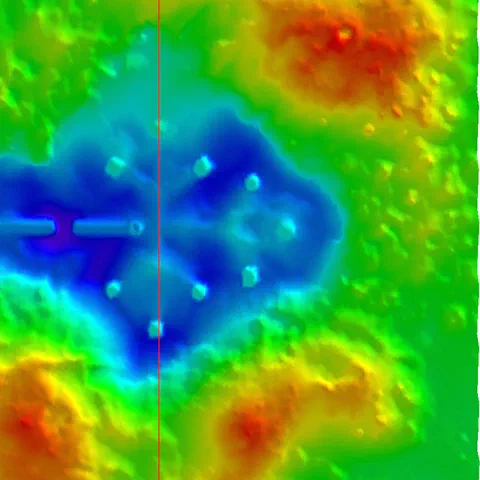 Gridded bathymetric color map showing scour and deposition around pier footings
