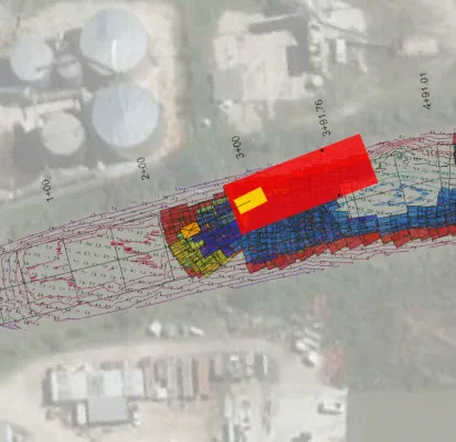 ClamVision screen showing a barge outline and bucket position over an aerial image of a dredge site